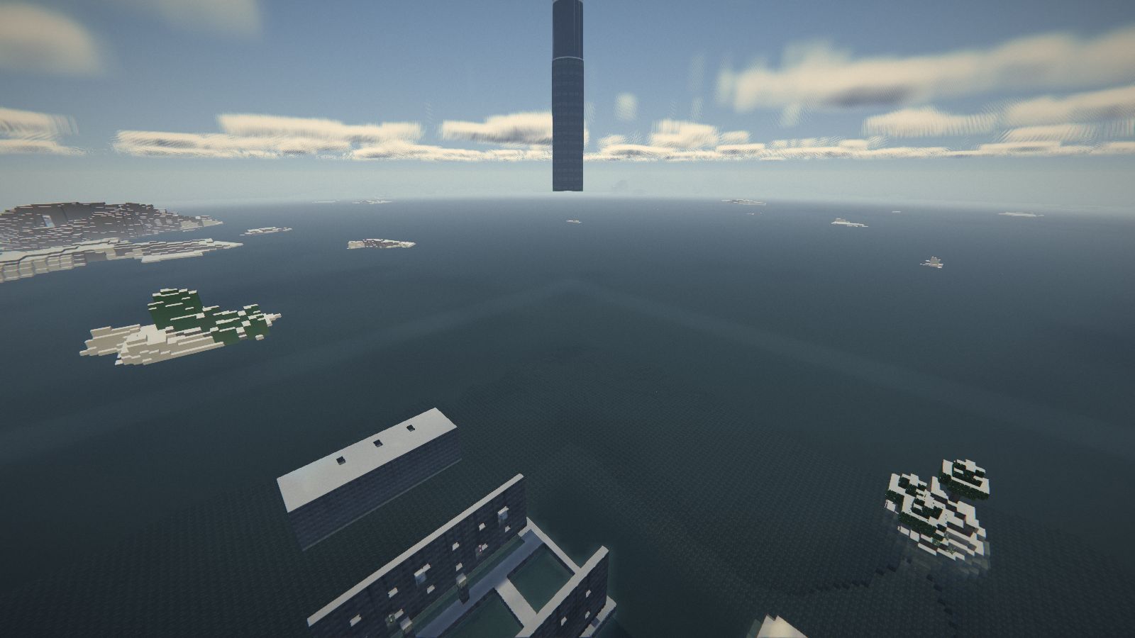 La ville de test vue d’en haut, toits blancs et îles enneigées à l’horizon